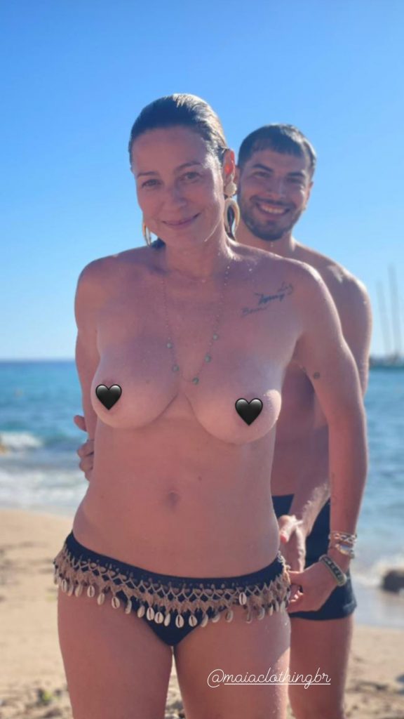 Luana Piovani faz topless em dia de praia com o namorado